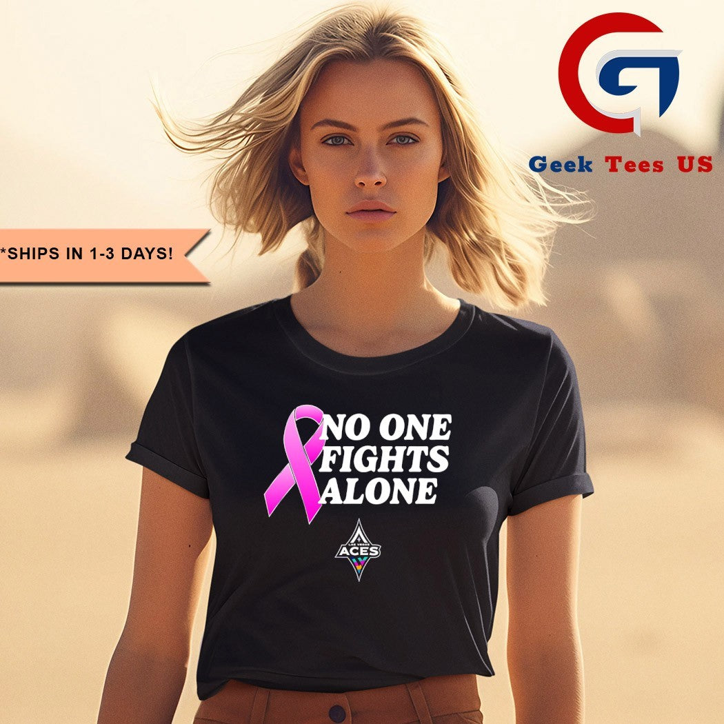 Chelsea Gray wearing No One Fights Alone United for a Cure Las Vegas Aces shirt