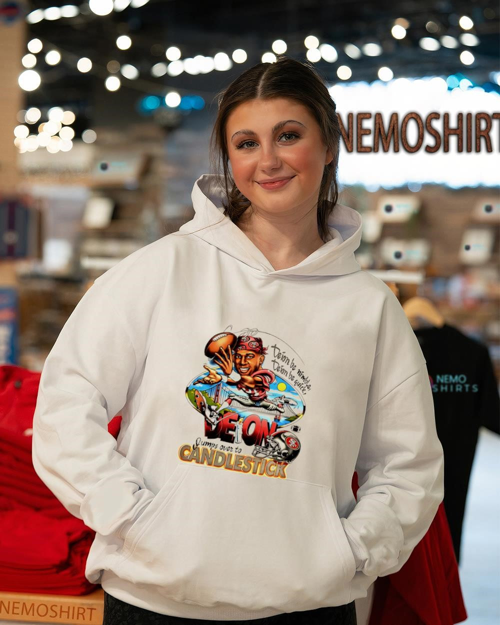 Deion Sanders San Francisco 49ers jumps over to Candlestic shirt