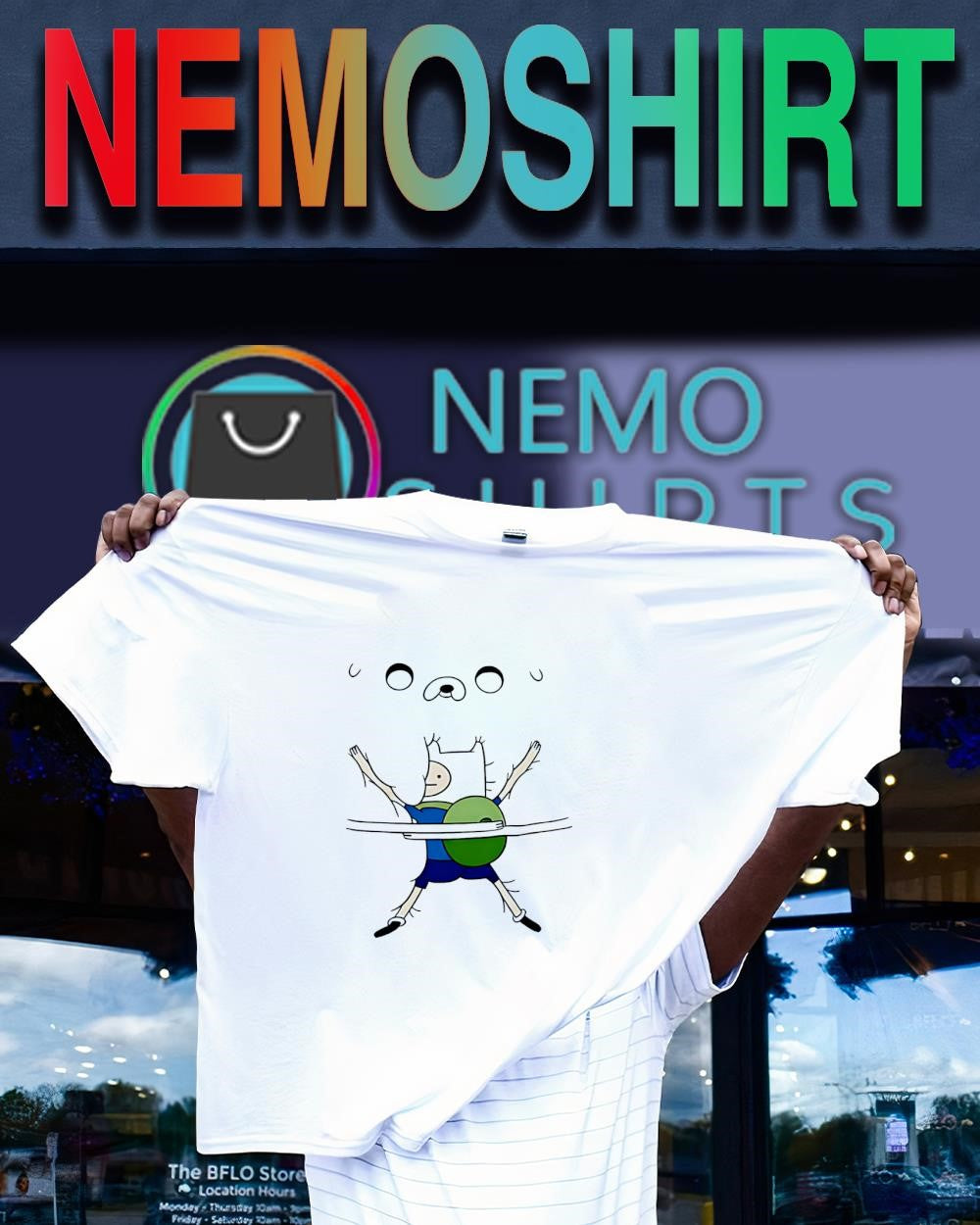 Finn holding Jake Adventure Time shirt