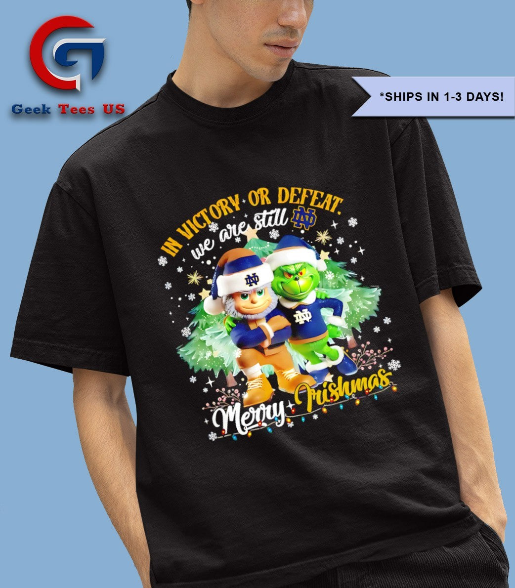 Grinch in victory or defeat we are still Merry Christmas Notre Dame Fighting Irish Merry Christmas 2025 shirt