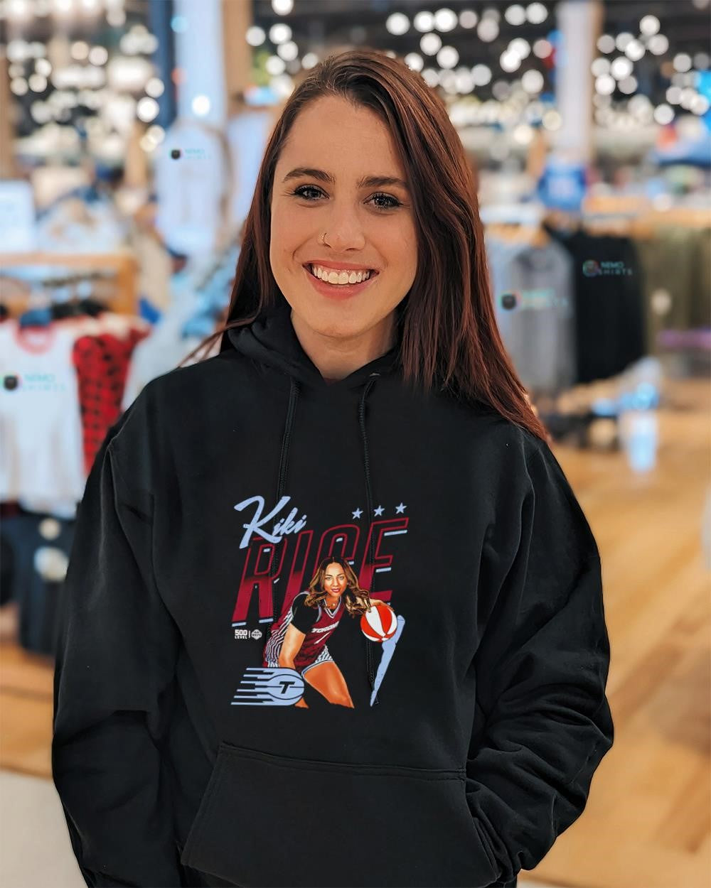 Kiki Rice Toronto Tempo basketball player pose shirt