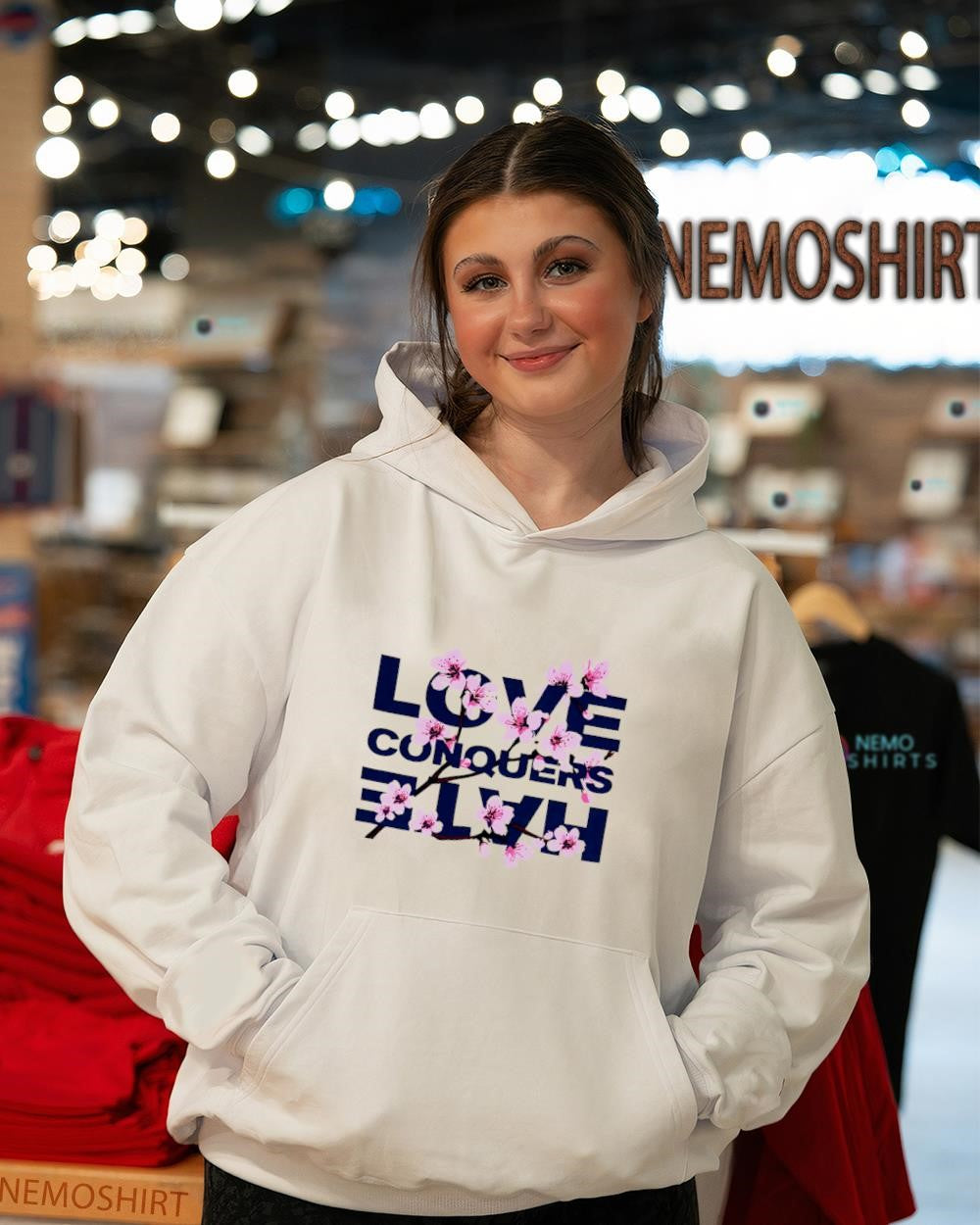 Love conquers hate cherry blossom graphic shirt