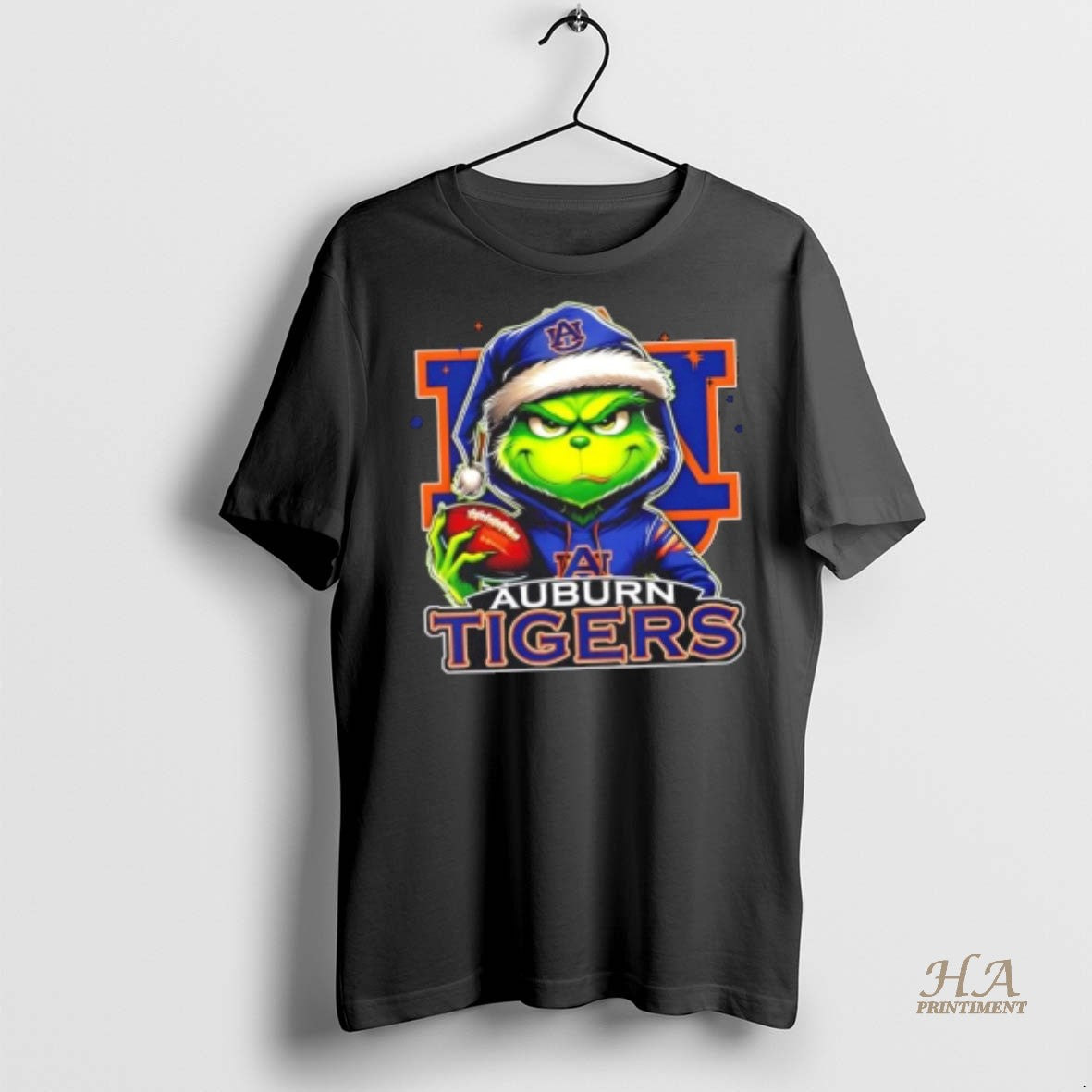 Official Grinch Is Holding A Ball And Smiling At Auburn Tigers Fans Christmas Shirt