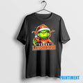 Official Grinch Is Holding A Ball And Smiling At Texas Longhorns Fans Christmas Tee Sweater