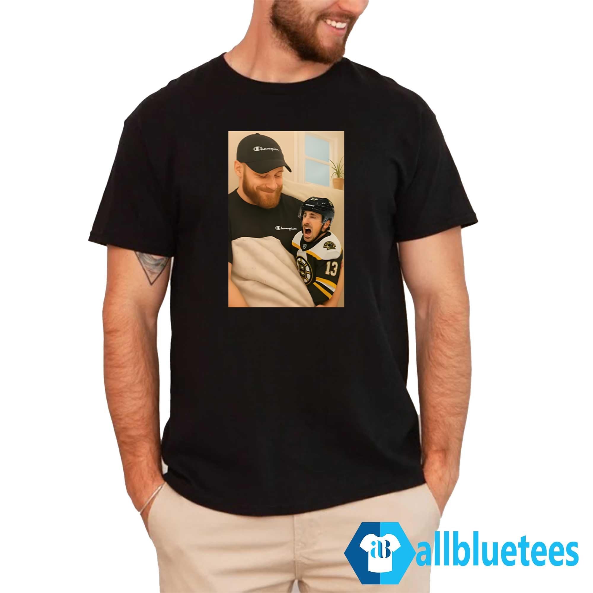 Sam Bennett Holding A Crying Marchand Shirt