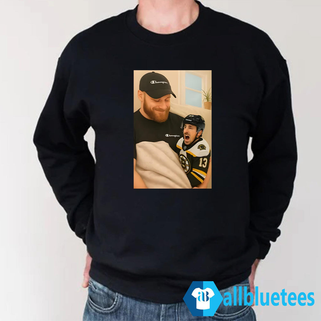 Sam Bennett Holding A Crying Marchand Shirt