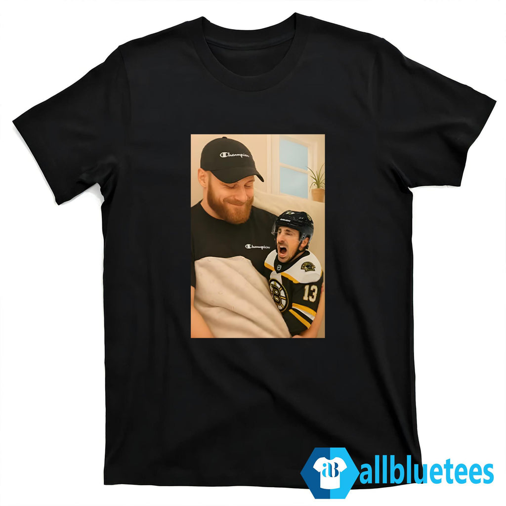Sam Bennett Holding A Crying Marchand Shirt