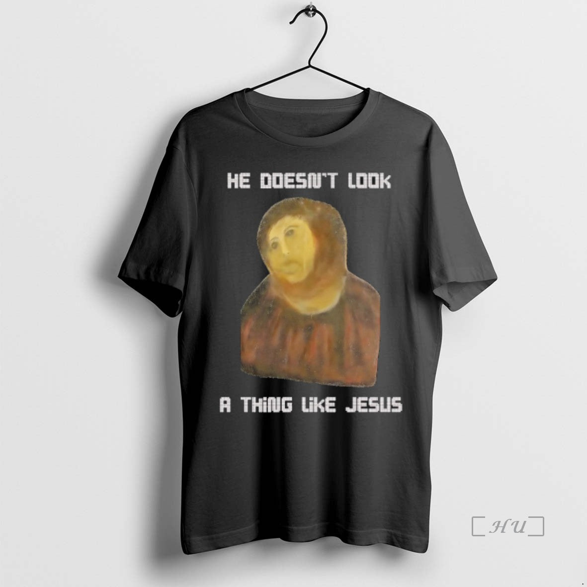 Trending He Doesnt Look A Thing Like Jesus Meme T Shirt Sweater