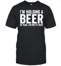I’m holding a beer so year I’m pretty busy Unisex T-Shirt