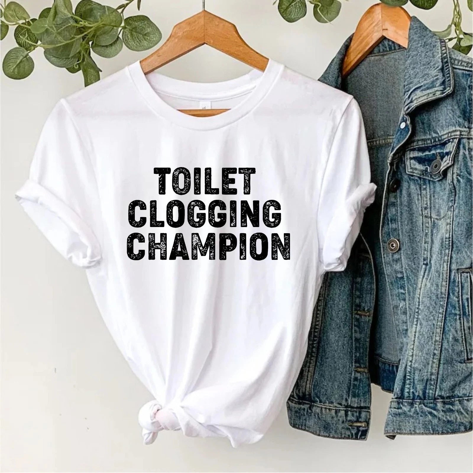 Funny Toilet Clogging Champion T-Shirt – Joke Shirt Humor Meme Gag Gift Tee